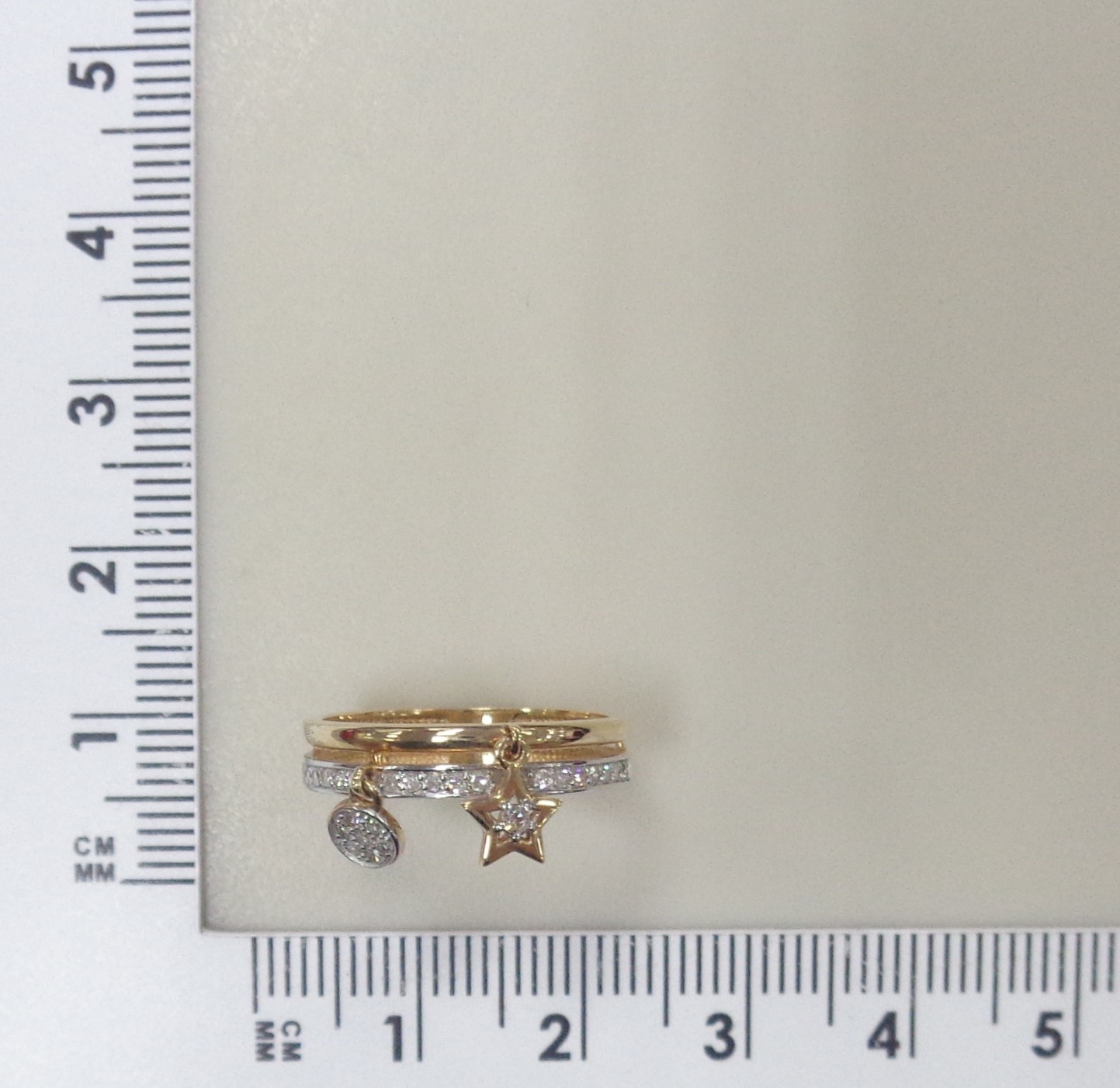 Золотое кольцо 585 пробы; родий; с подвесн. эл.; вставки 1 Бр.Кр-17 0,013 2/2А; 28 Бр.Кр-17 0,136 2/